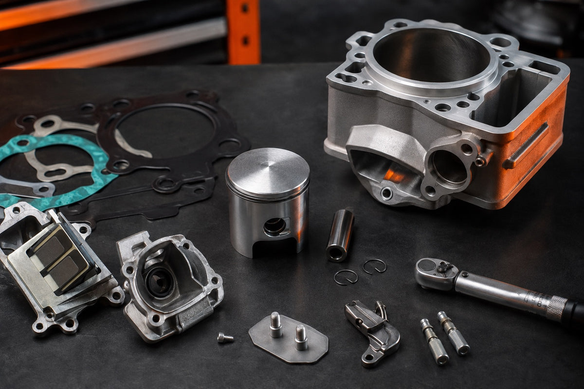Two-stroke piston, cylinder and power-valve components for a KTM 300 EXC top-end rebuild