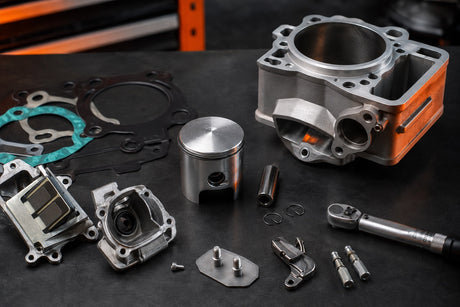 Two-stroke piston, cylinder and power-valve components for a KTM 300 EXC top-end rebuild